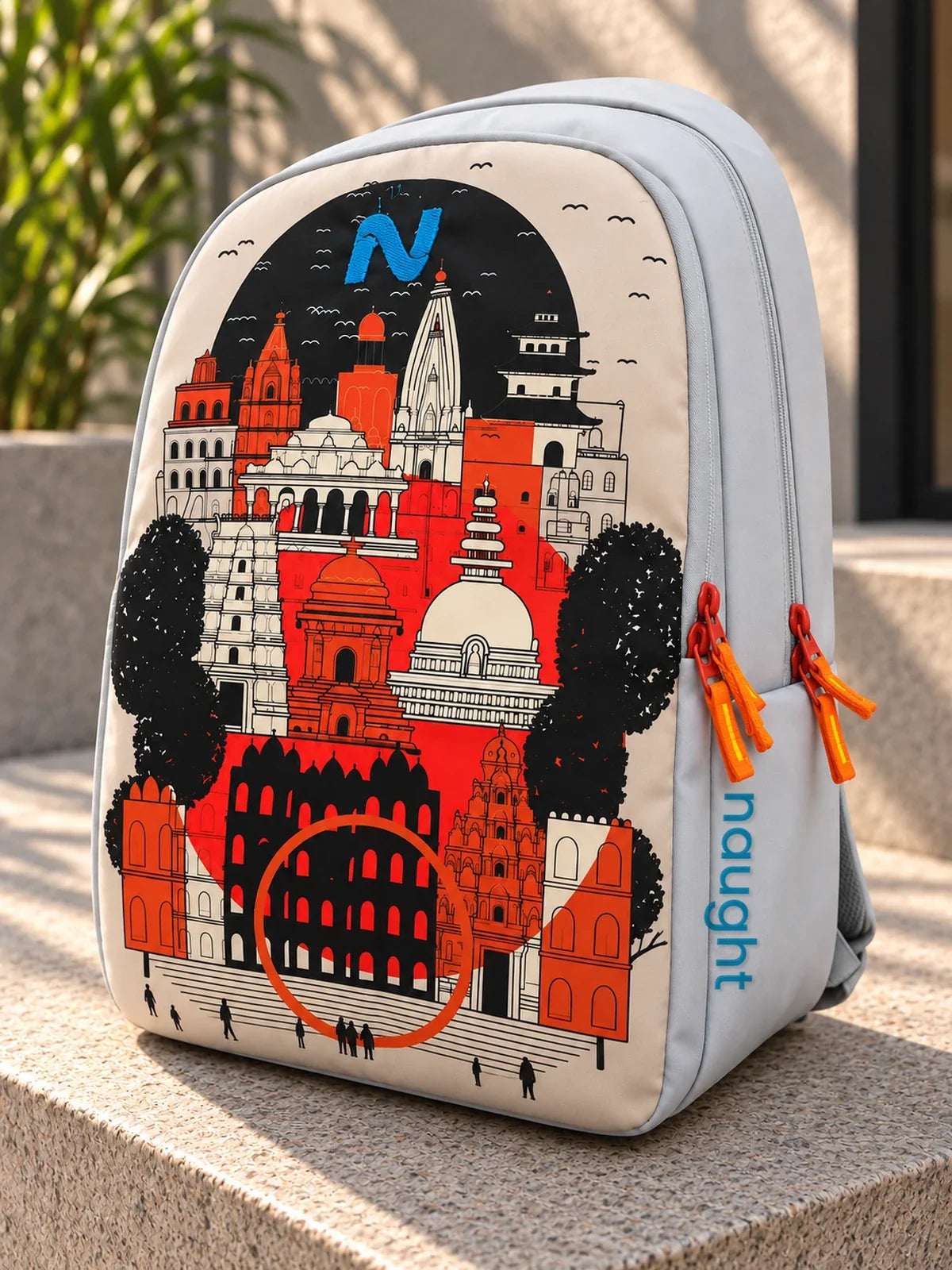 Naught Indian Heritage Backpack side view with naught wordmark and orange zip pulls