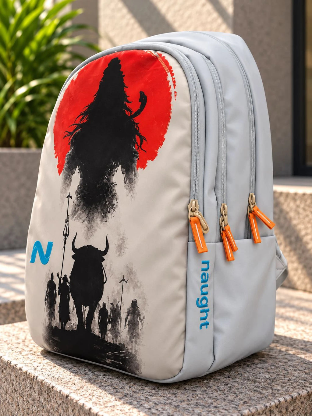 Naught Lord Shiva Backpack side view with naught wordmark and orange zip pulls