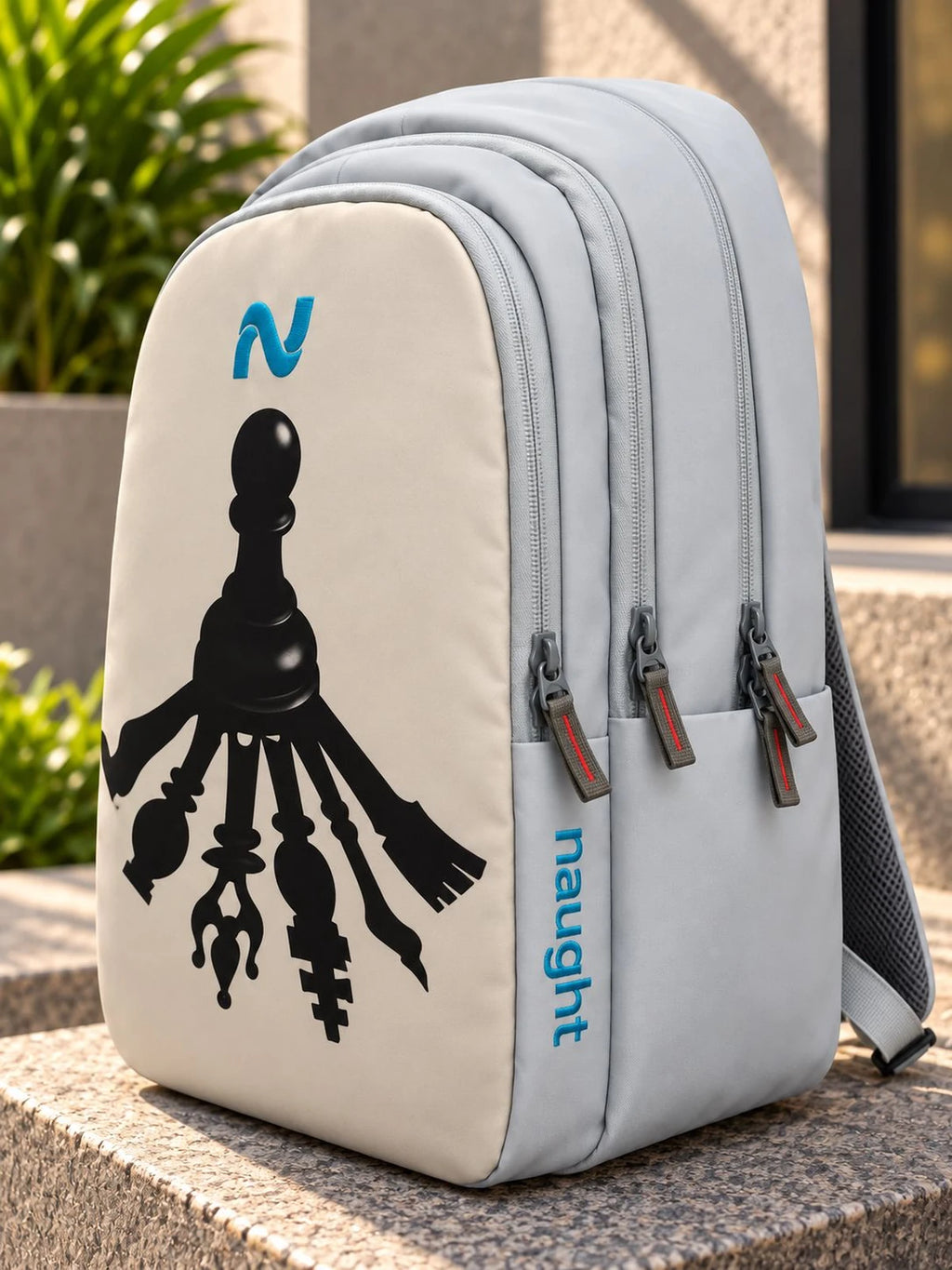 Naught Potential Unlocker Backpack side view with naught wordmark and triple zip pockets